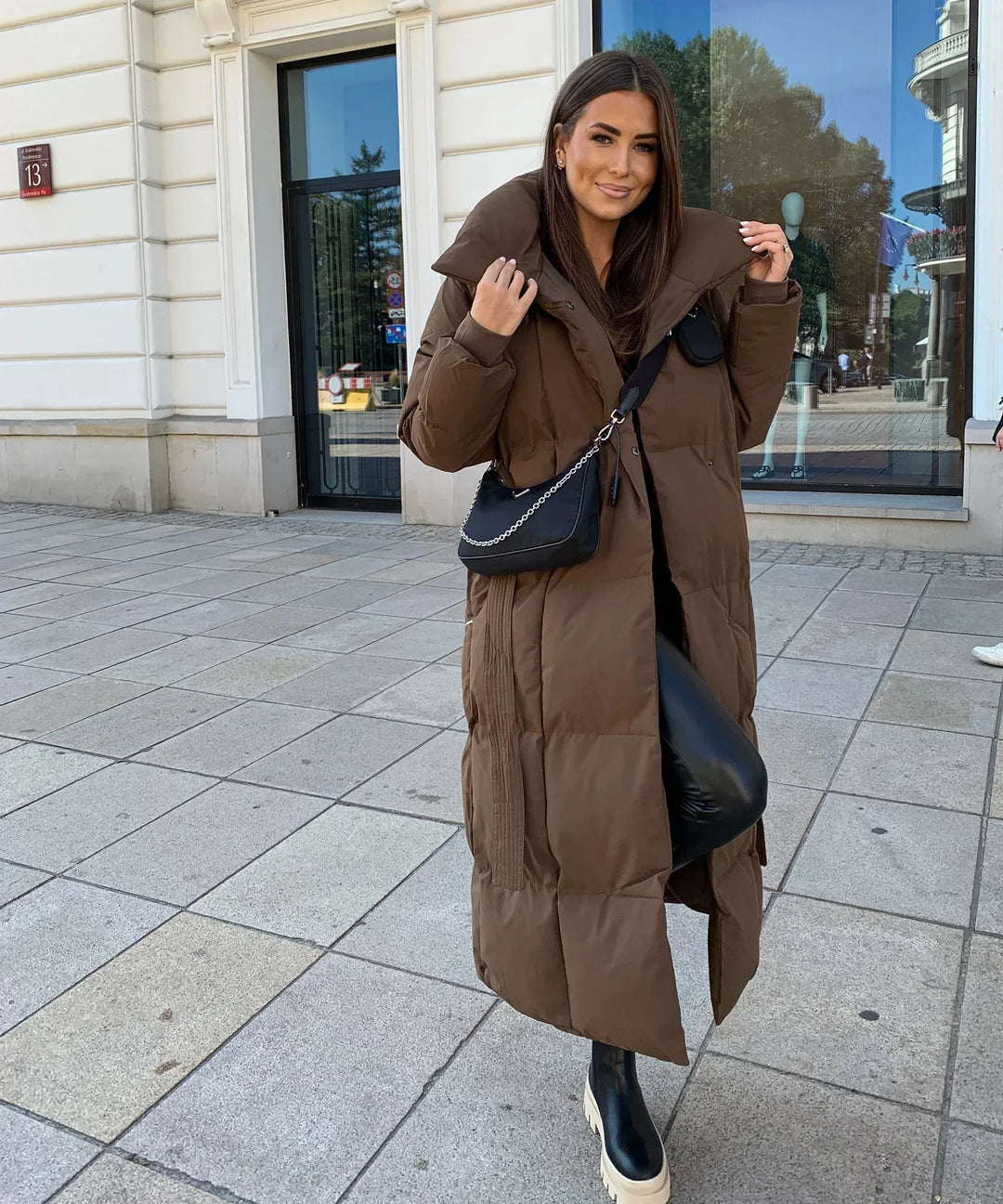 Mia | Stylische lange Pufferjacke mit Gürtel