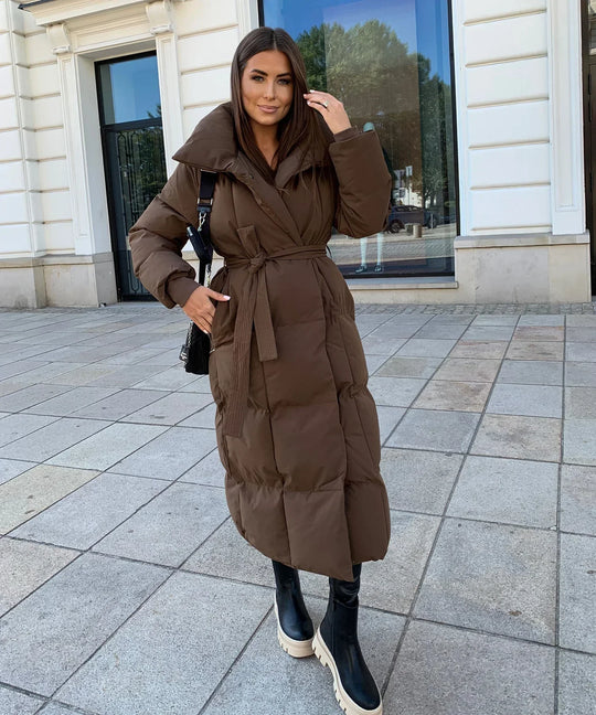 Mia | Stylische lange Pufferjacke mit Gürtel